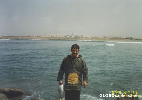 Postcard a fishing man
