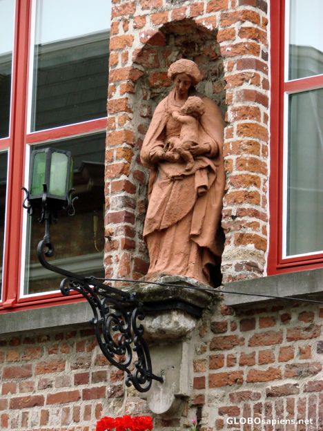 Postcard statue on a building