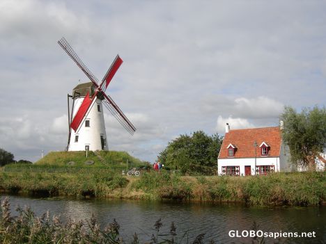 Postcard Canal side the working windmill
