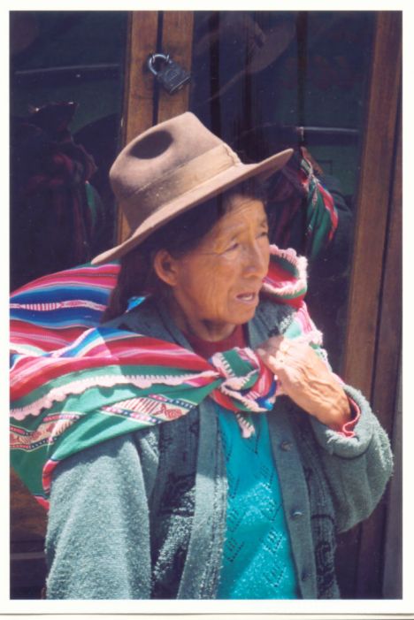Postcard woman carrying a bag in Potosi
