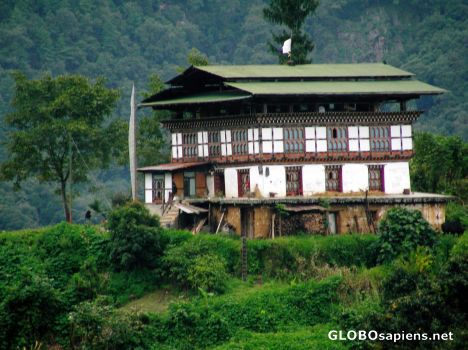 Postcard Bhutanese farmhouse