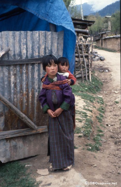 Postcard Bhutan, Gangte, Child takes care of Child