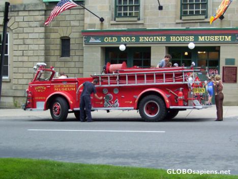 Postcard Historical Fire truck in front of the Museum