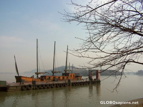 Postcard Wooden boat by the tourist pier at Lake Taihu