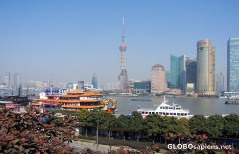 Postcard Boat of all kind and sizes are on Huangpu river