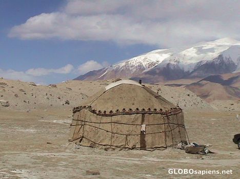 Postcard Kyrgyz yurt in the high mountains