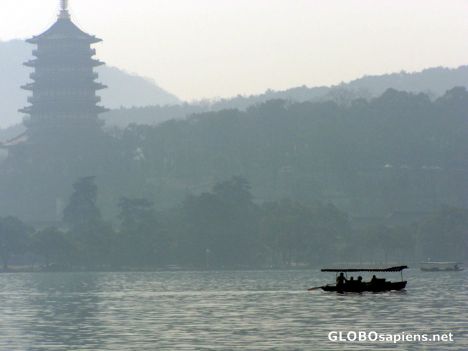 Postcard Boat under the foggy shadow of the Baiyun Temple