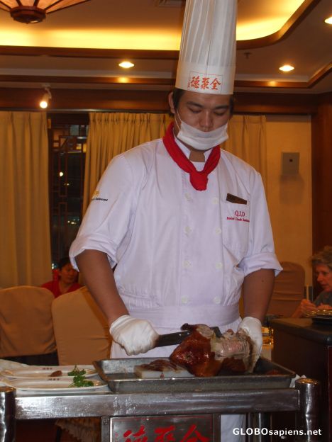 Postcard Chef carving our Peking Duck