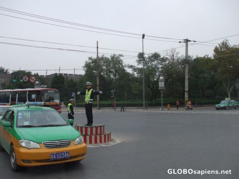 Postcard Chinese policeman directing traffic