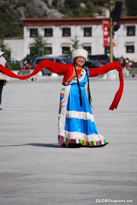 Postcard Chinese tourist in a Tibetan costume
