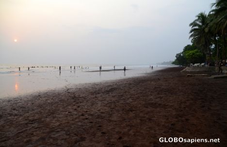 Postcard Idenau (CM) - Sunset on chocolate coloured beach