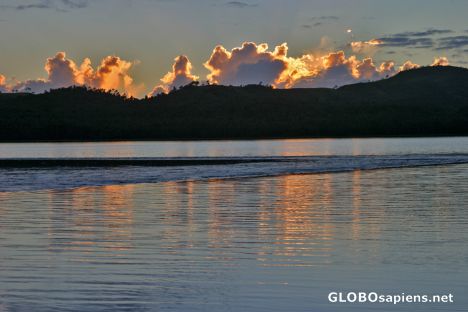 Postcard Sunset reflections on Aitutaki lagoon