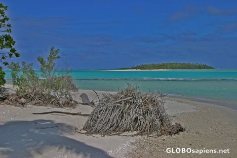 Postcard One Foot Island, the tiniest motu in Aitutaki