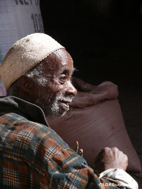 Postcard Old Afar man on the market