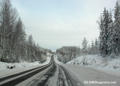 Postcard Snowy road in Finland