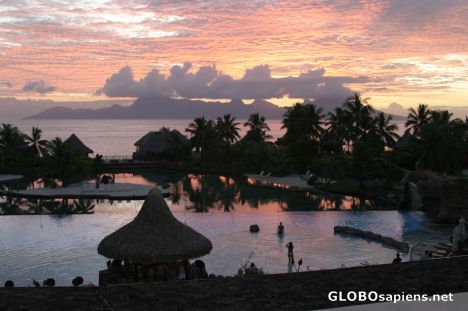 Postcard Sunset on Moorea island and Beachcomber Hotel
