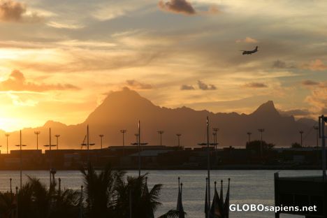 Postcard Setting sun over Papeete Harbor