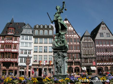 Postcard Sculpture and german style buildings.