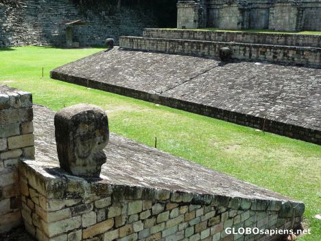 Postcard Parrot head markers on Mayan Ballcourt