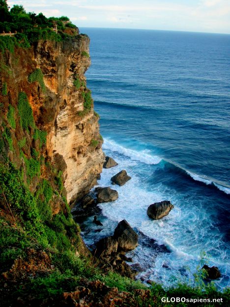 Postcard beautiful cliff and blue ocean at Uluwatu, Bali