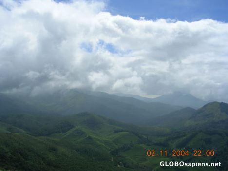 Postcard Kerala Rows of mountains all lush green