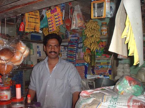 Postcard Local shopkeeper at Kakkodi village, Kozhikode