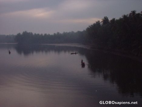 Postcard Dawn breaking over Kerala river