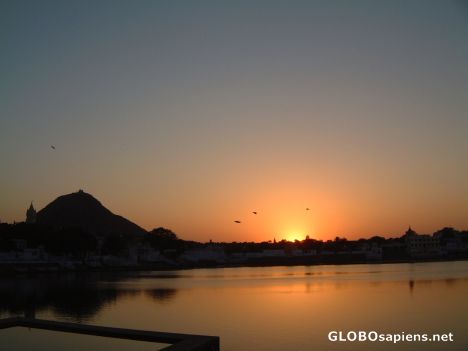 Postcard Sunset over the holy lake in Pushkar
