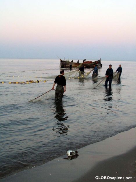Postcard fisherman in caspian sea