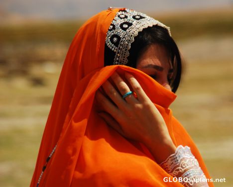 Postcard nomad lady in orange