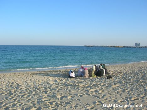 Postcard Women resting on the beach