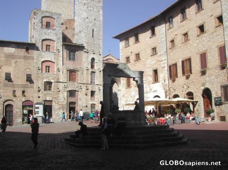 Postcard La Cisterna - The old cistern centering a Piazza