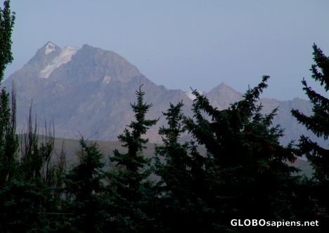Postcard Karakol - Mountains in the background