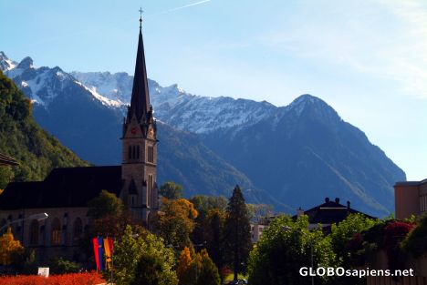 Postcard Vaduz - church and the Alps
