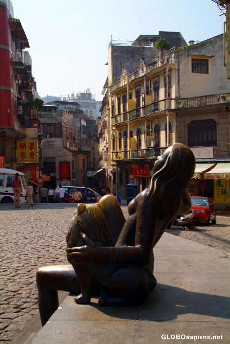 Postcard Macau - bronze statue and Portuguese architecture