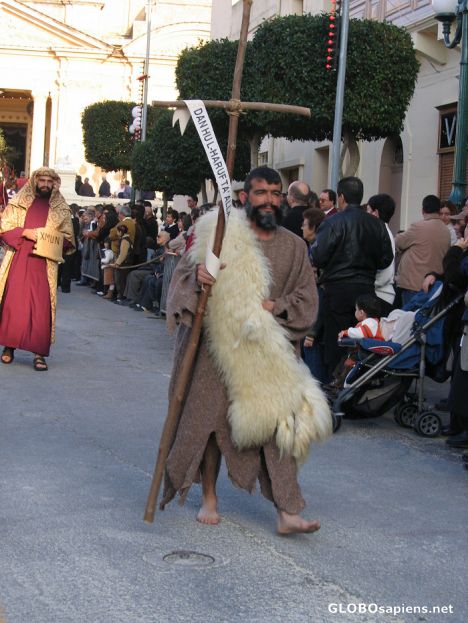 Postcard Participant in Easter procession in Nadur