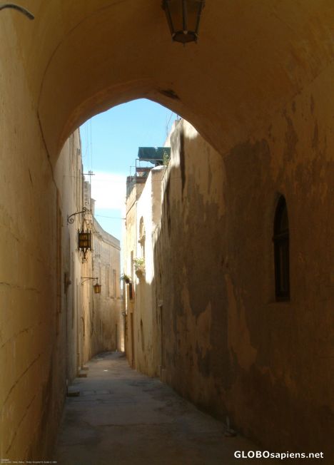 Postcard Mdina - an alley with a lantern