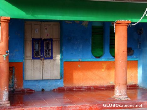 Postcard Colourful house in Isla (orange, green, turquoise)