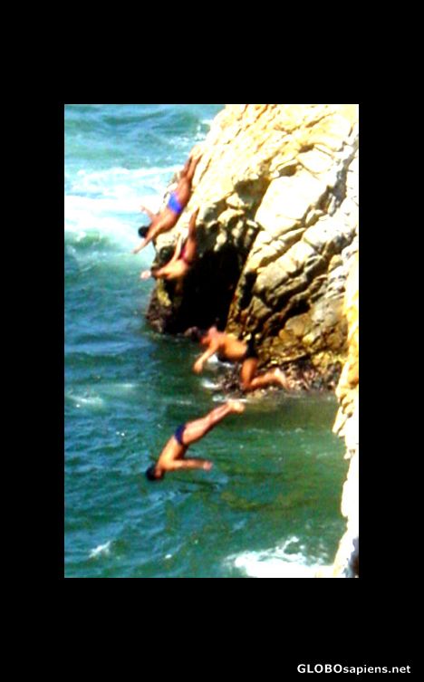 Postcard Cliff Divers in mid dive