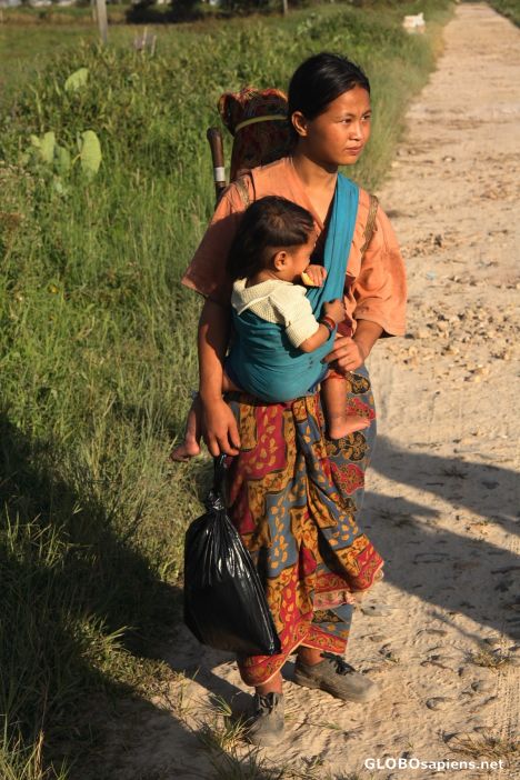 Postcard Kelabit woman with a child