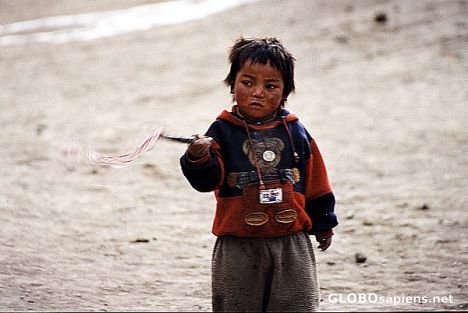 Postcard Child playing in Muktinath