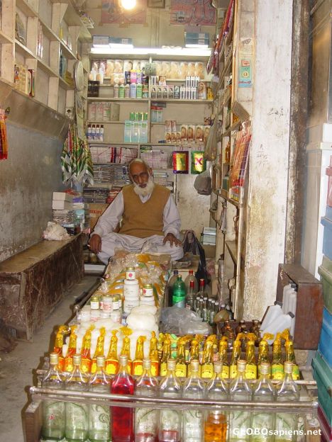 Postcard Local Perfume seller in Qissa Khawani Bazar.