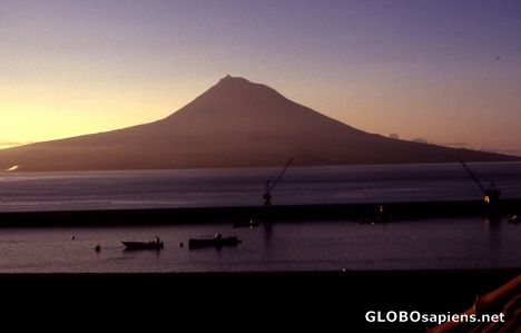 Postcard Faial Island - Sunrise behind Pico Island -