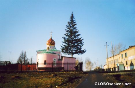 Postcard Main Church in the Taiga village
