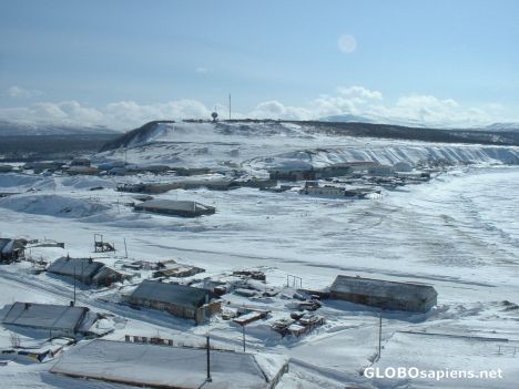 Postcard Kurilsk town in winter