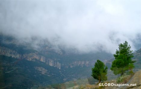 Postcard Montserrat Mountain in the clouds