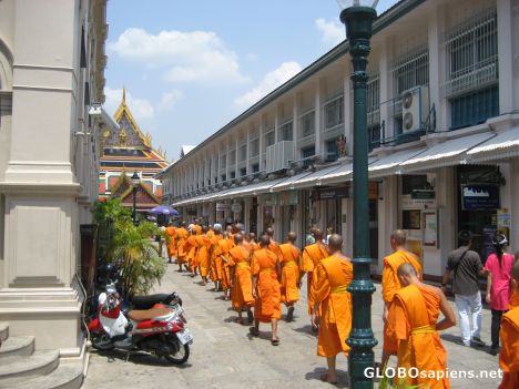 Postcard Monks file into the Grand Palace