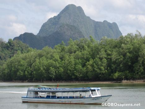 Postcard motorboat ride to james bond island