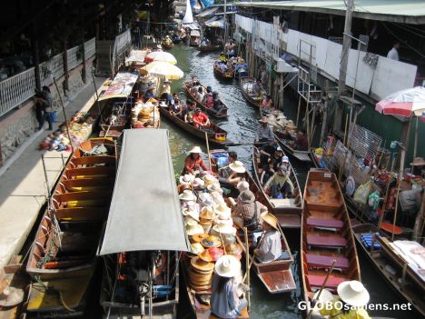Postcard Damnoen Saduak Floating Market at height of day