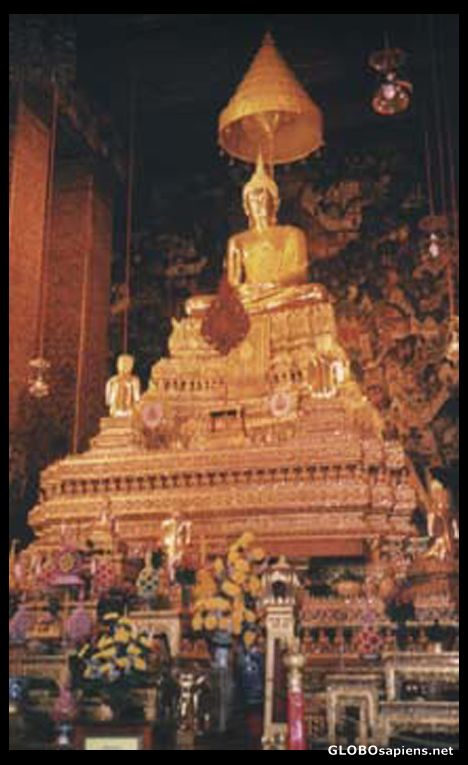 Postcard Budha statue inside the temple.